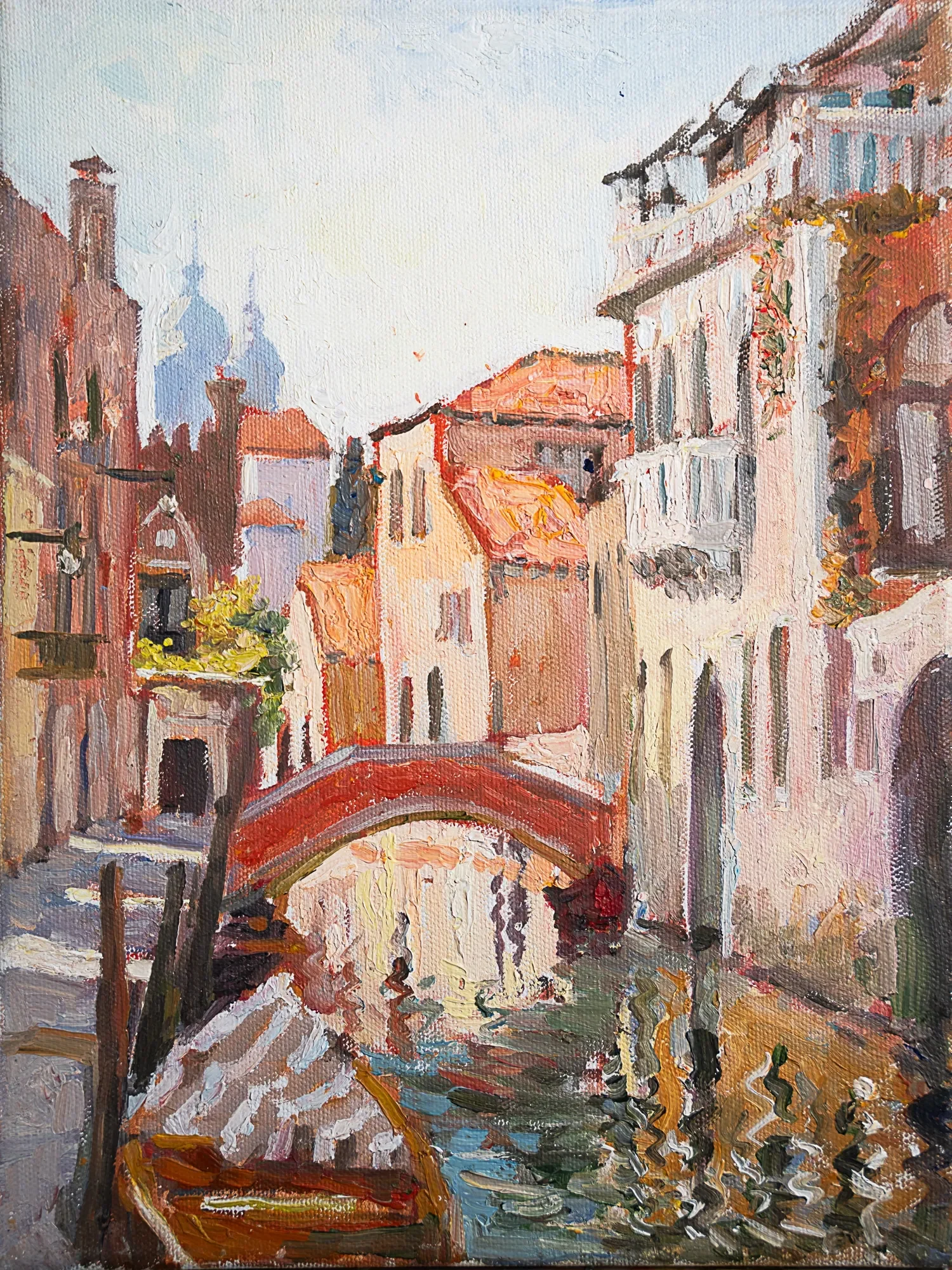 A bridge over a canal between sunlit buildings — painting by Violetta Chandler